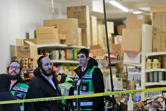 Emergency responders work at a kosher supermarket, the site of a shooting in Jersey City, N.J., on December 11, 2019.